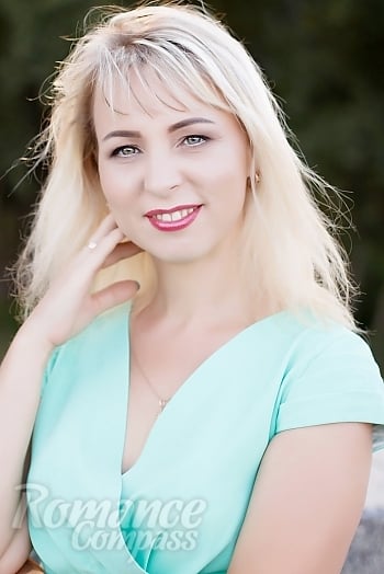 Ukrainian mail order bride Julia from Dnipro with blonde hair and green eye color - image 1
