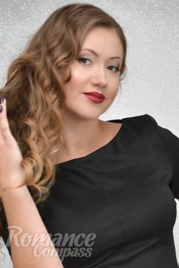 Ukrainian mail order bride Marina from Glukhov with light brown hair and hazel eye color - image 1