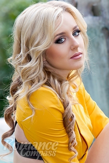 Ukrainian mail order bride Tatiana from Odessa with light brown hair and blue eye color - image 1