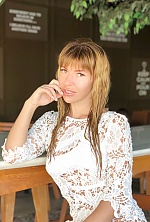 Ukrainian mail order bride Natalia from Rostov with auburn hair and hazel eye color - image 2
