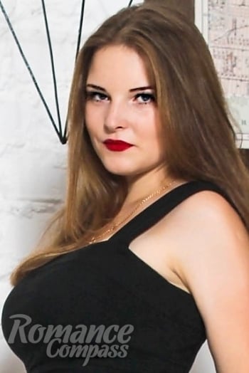 Ukrainian mail order bride Karina from Kiev with light brown hair and blue eye color - image 1