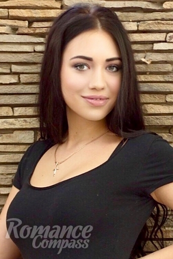 Ukrainian mail order bride Irina from Cherkassy with black hair and green eye color - image 1