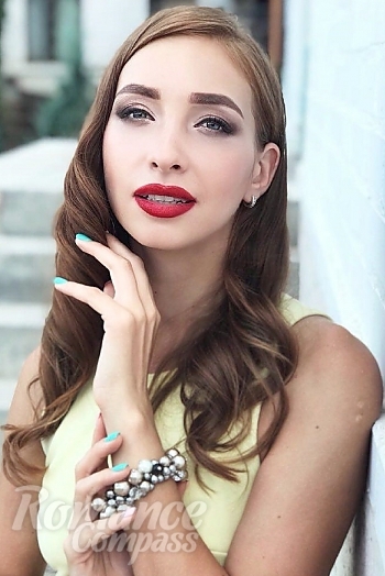 Ukrainian mail order bride Anastasiya from Nikolaev with red hair and green eye color - image 1