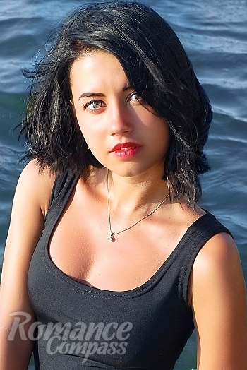 Ukrainian mail order bride Marina from Dnipro with black hair and green eye color - image 1