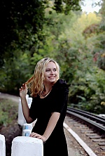 Ukrainian mail order bride Oksana from Dnipro with blonde hair and green eye color - image 4