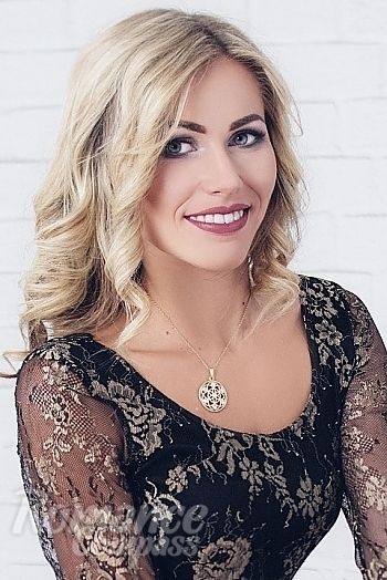Ukrainian mail order bride Julia from Kiev with blonde hair and hazel eye color - image 1