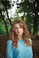 Ukrainian mail order bride Olga from Kiev with light brown hair and blue eye color - image 4