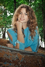 Ukrainian mail order bride Olga from Kiev with light brown hair and blue eye color - image 5