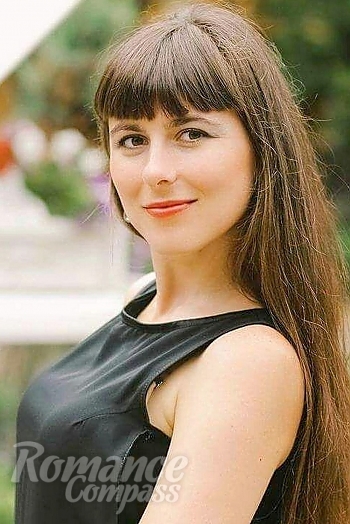 Ukrainian mail order bride Natalija from Mukachevo with brunette hair and green eye color - image 1