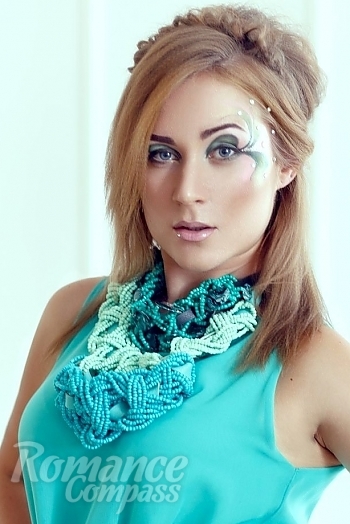 Ukrainian mail order bride Anastasia from Kiev with light brown hair and green eye color - image 1