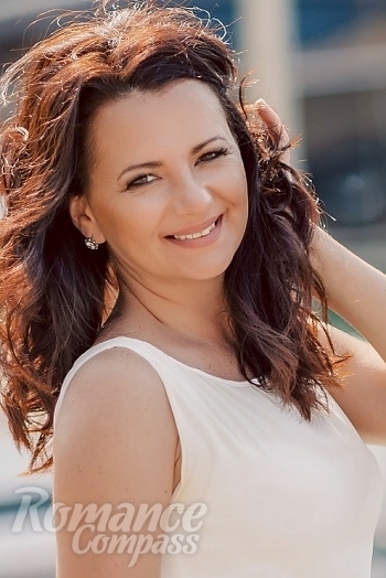 Ukrainian mail order bride Elena from Simferopol with brunette hair and hazel eye color - image 1