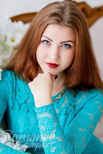Ukrainian mail order bride Juliya from Zaporozhye with light brown hair and blue eye color - image 1