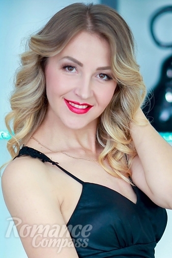 Ukrainian mail order bride Tatiana from Nikolaev with blonde hair and brown eye color - image 1