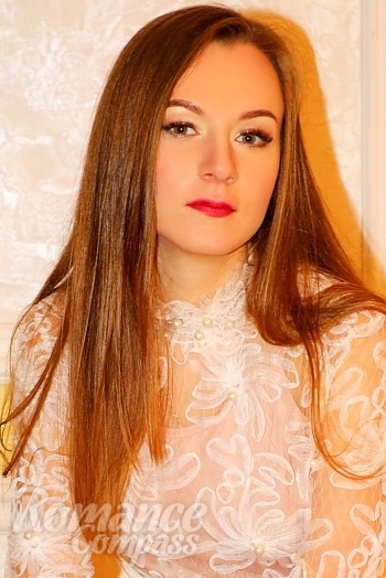 Ukrainian mail order bride Alina from Sumy with light brown hair and green eye color - image 1