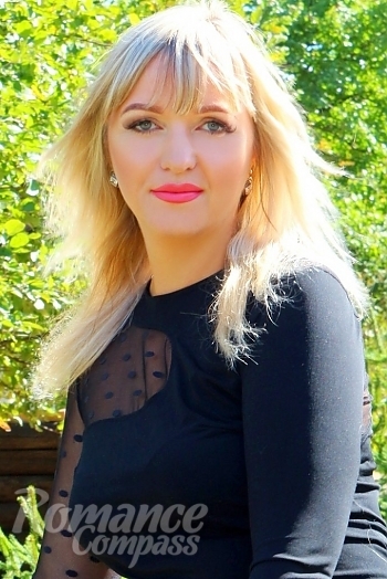 Ukrainian mail order bride Anna from Sumy with blonde hair and grey eye color - image 1