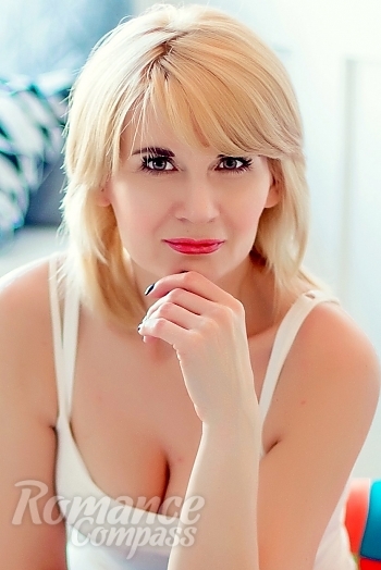 Ukrainian mail order bride Elena from Kyiv with blonde hair and green eye color - image 1