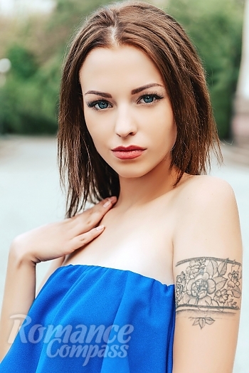 Ukrainian mail order bride Valeria from Kharkov with light brown hair and blue eye color - image 1