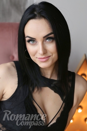 Ukrainian mail order bride Julia from Cherkasy with black hair and green eye color - image 1