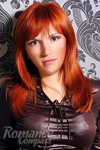 Ukrainian mail order bride Olga from Odessa with red hair and brown eye color - image 1