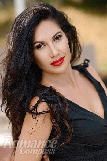 Ukrainian mail order bride Irina from Odessa with black hair and brown eye color - image 1