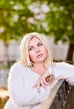 Ukrainian mail order bride Irina from Dnipro with blonde hair and black eye color - image 9
