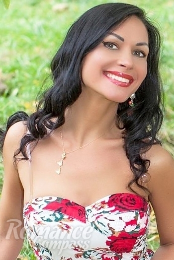 Ukrainian mail order bride Elena from Odessa with black hair and green eye color - image 1