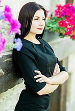 Ukrainian mail order bride Oksana from Kiev with black hair and green eye color - image 6