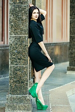 Ukrainian mail order bride Oksana from Kiev with black hair and green eye color - image 8