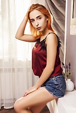Ukrainian mail order bride Anastasia from Kiev with auburn hair and green eye color - image 9