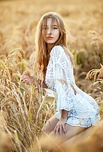 Ukrainian mail order bride Liza from Kharkov with light brown hair and green eye color - image 4
