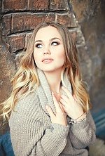 Ukrainian mail order bride Anastasia from Kiev with light brown hair and blue eye color - image 2