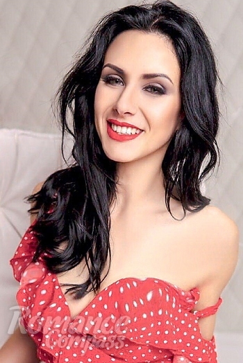 Ukrainian mail order bride Olga from Kiev with black hair and green eye color - image 1
