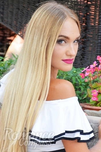 Ukrainian mail order bride Anastasia from Kharkov with blonde hair and blue eye color - image 1