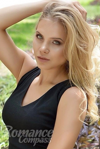Ukrainian mail order bride Ludmila from Kharkov with blonde hair and green eye color - image 1