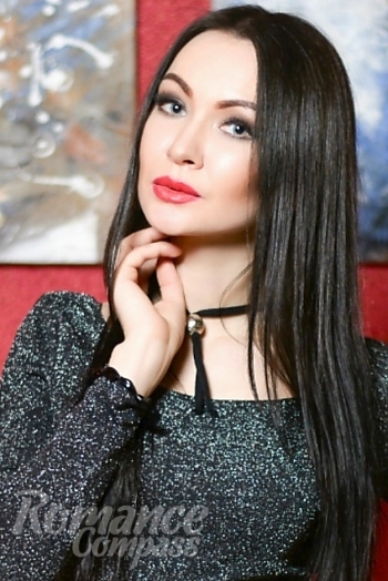 Ukrainian mail order bride Lana from Kharkiv with black hair and blue eye color - image 1