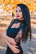 Ukrainian mail order bride Oksana from Lutugino with black hair and green eye color - image 7