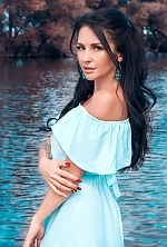 Ukrainian mail order bride Oksana from Lutugino with black hair and green eye color - image 2