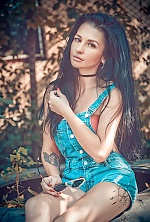 Ukrainian mail order bride Oksana from Lutugino with black hair and green eye color - image 3