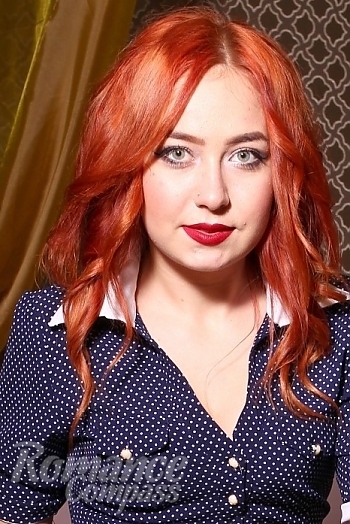 Ukrainian mail order bride Lilya from Kiev with red hair and green eye color - image 1