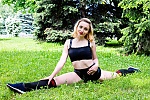 Ukrainian mail order bride Bogdana from Kremenchuk with light brown hair and blue eye color - image 10