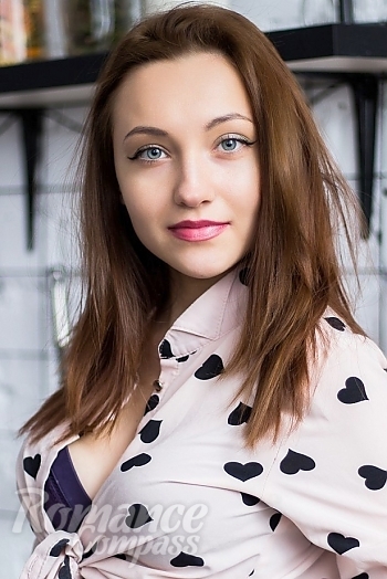 Ukrainian mail order bride Bogdana from Kremenchuk with light brown hair and blue eye color - image 1