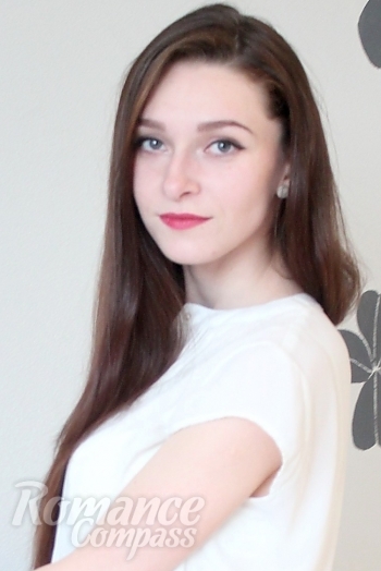 Ukrainian mail order bride Elena from Luhansk with light brown hair and blue eye color - image 1