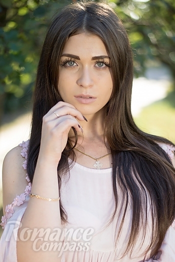 Ukrainian mail order bride Julia from Mariupol with black hair and hazel eye color - image 1