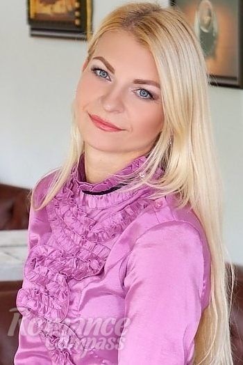 Ukrainian mail order bride Tatiana from Sumy with blonde hair and blue eye color - image 1