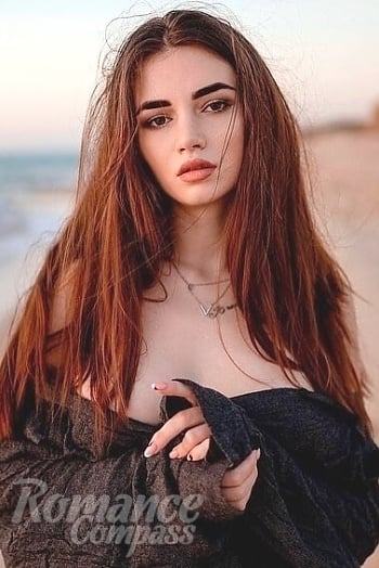 Ukrainian mail order bride Karina from Kharkiv with brunette hair and brown eye color - image 1