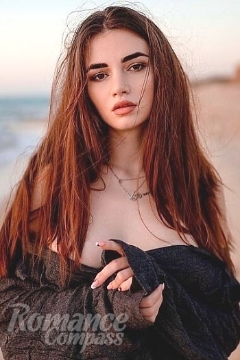 Ukrainian mail order bride Karina from Kharkiv with brunette hair and brown eye color - image 1