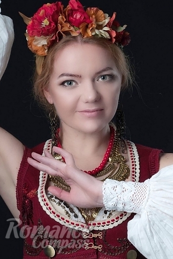Ukrainian mail order bride Olga from Cherkasy with red hair and blue eye color - image 1
