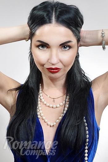 Ukrainian mail order bride Ilona from Kiev with black hair and grey eye color - image 1