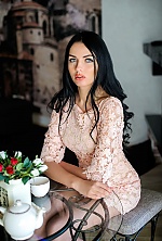 Ukrainian mail order bride Alesya from Kharkiv with black hair and green eye color - image 11
