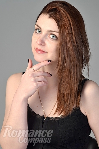 Ukrainian mail order bride Elena from Kharkiv with red hair and green eye color - image 1